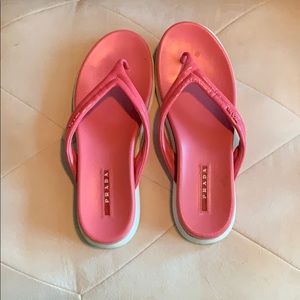 Pink Prada leather flip flops
